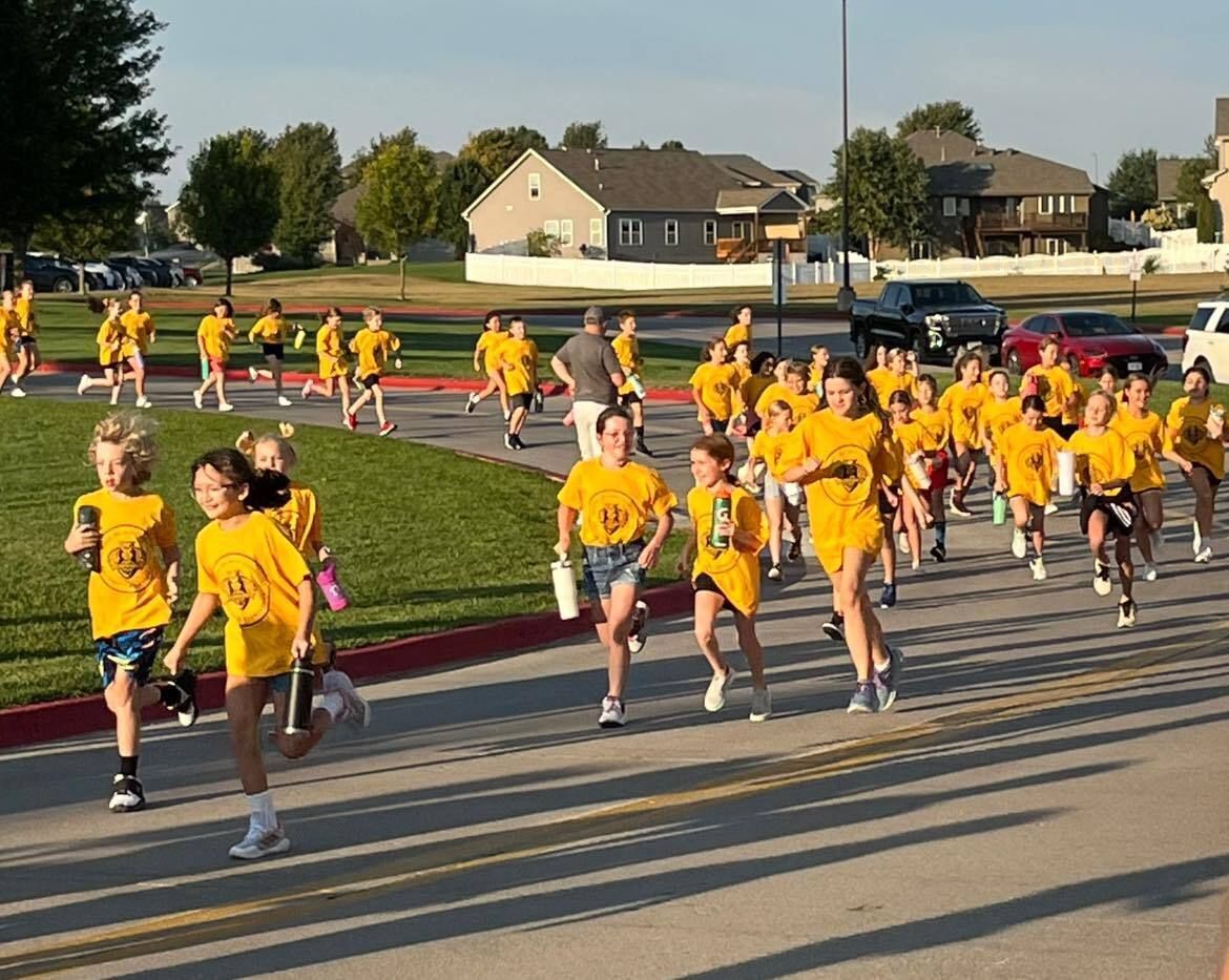 Students running in Fun Run