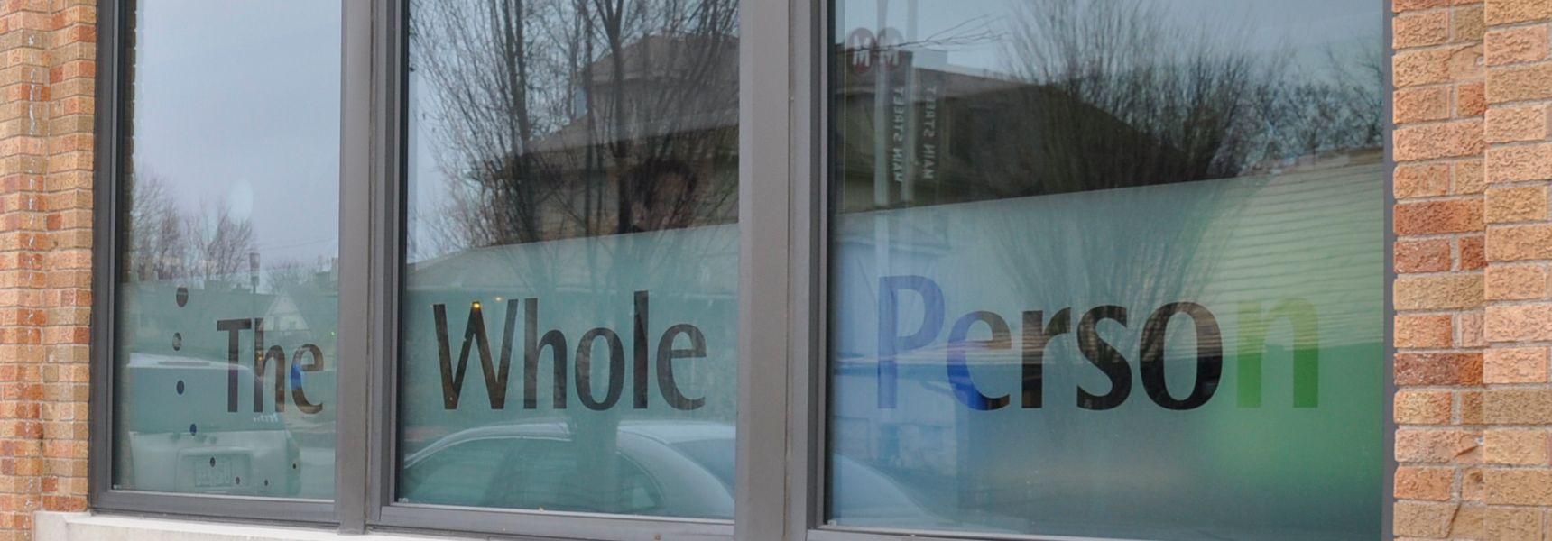 Exterior etched window with TWP logo