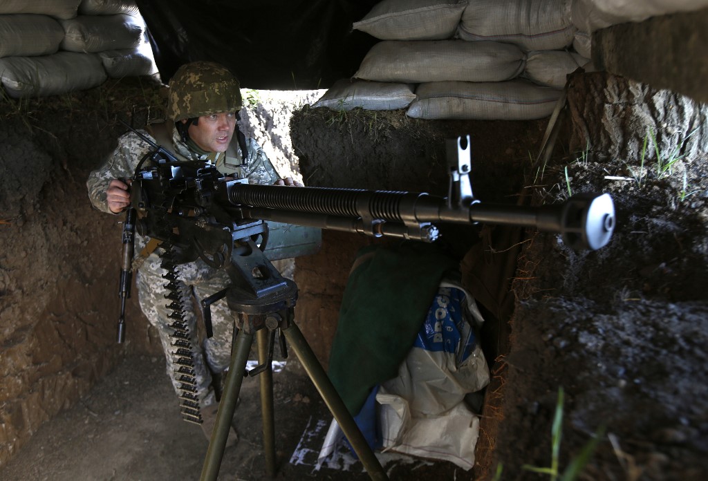 Russia-led forces attack Ukrainian positions in Donbas four times
