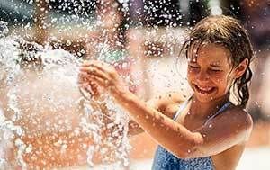 Girl playing with water.