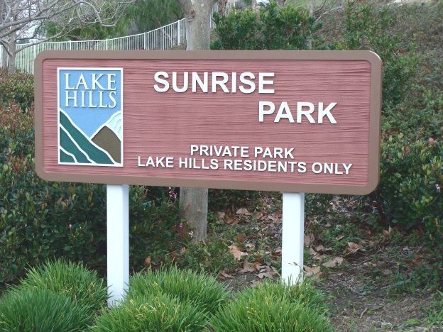 M4852- Two  Back-mounted 4 " x 4" Cedar Wood Posts Supporting a Large HDU Sunrise Park Sign