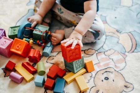 Child stacking blocks