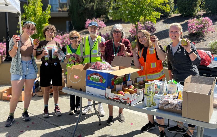 Group photo of happy volunteers at a distribution site