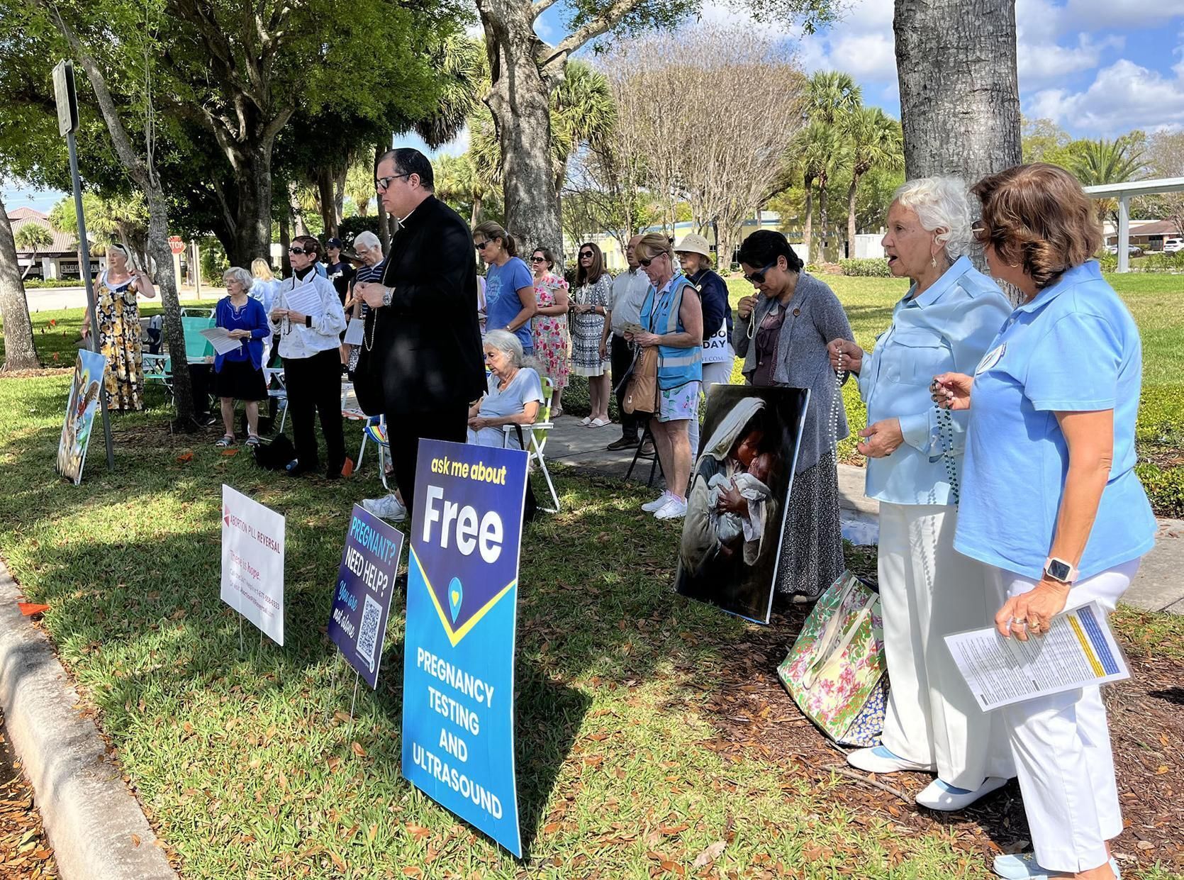 Bishop Manuel de Jesús Rodríguez prays across the street from the abortion center March 26, 2026