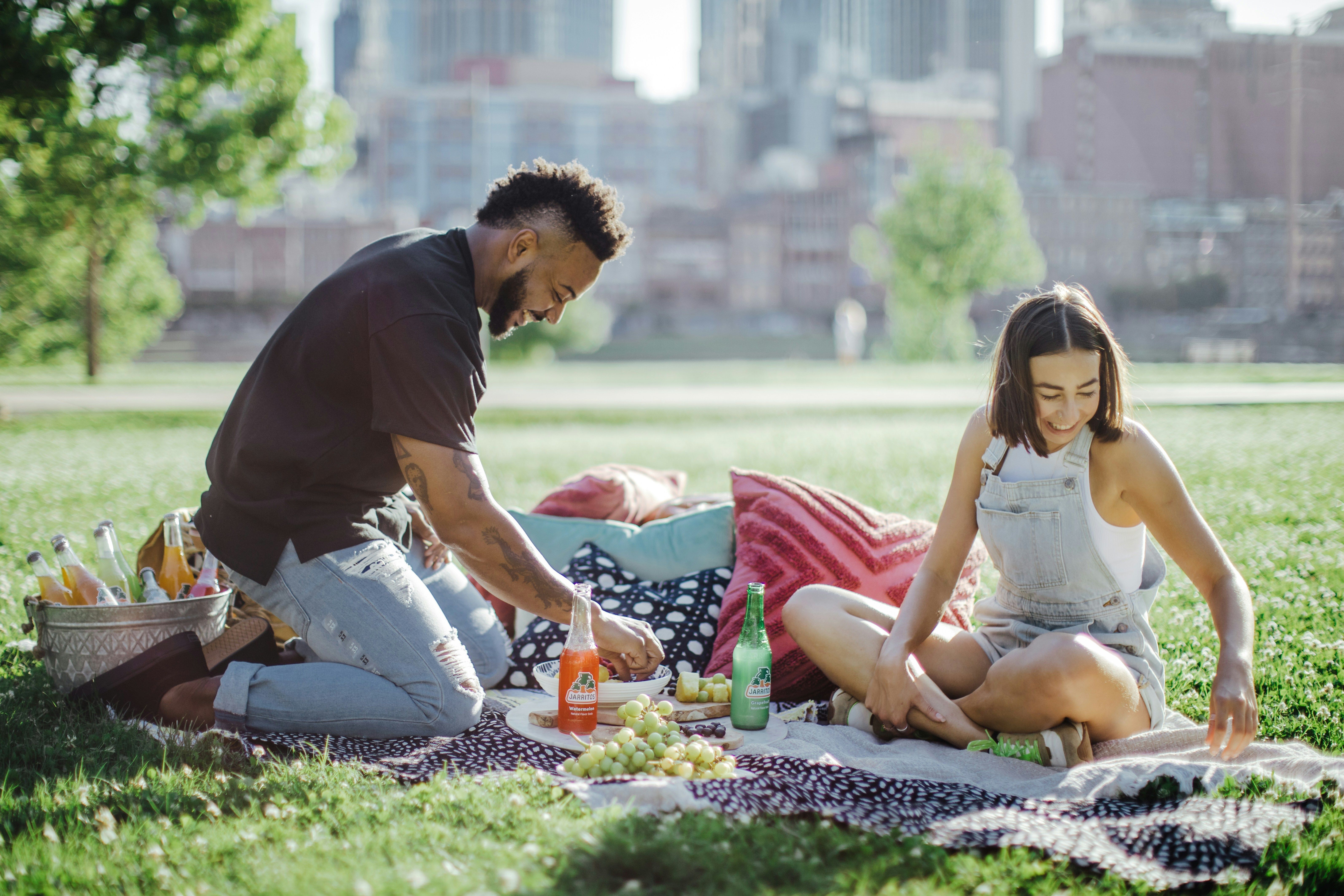 couple in park with picnic meal