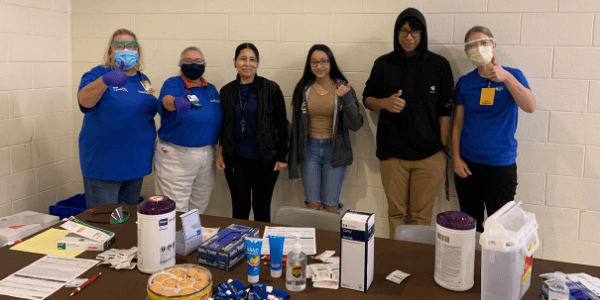 Froedtert employees and their families at Casa Guadalupe’s health fair in September 2021 where they offered COVID-19 vaccines.  