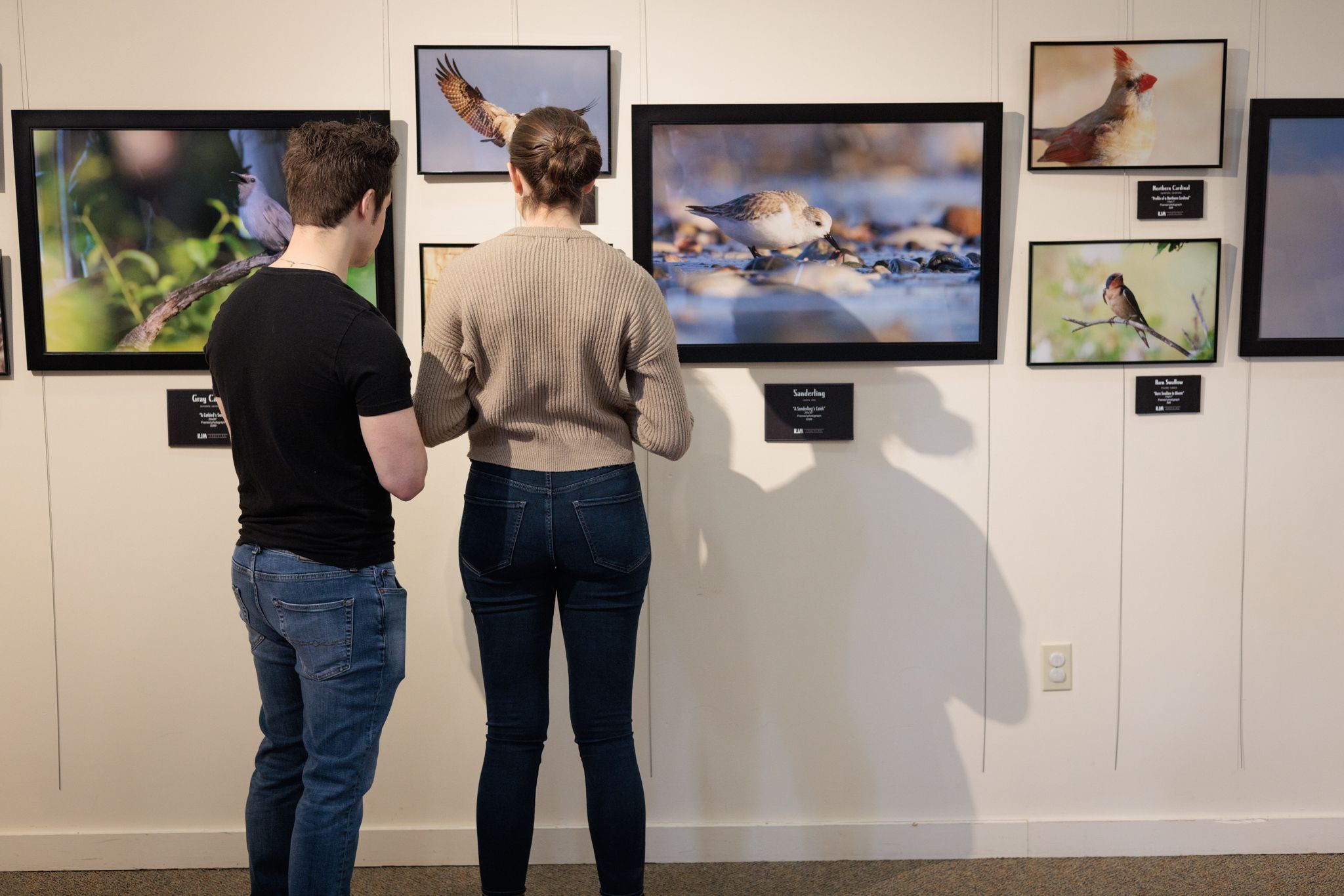 Guests enjoying photography by Ryan McAssey in March 2023