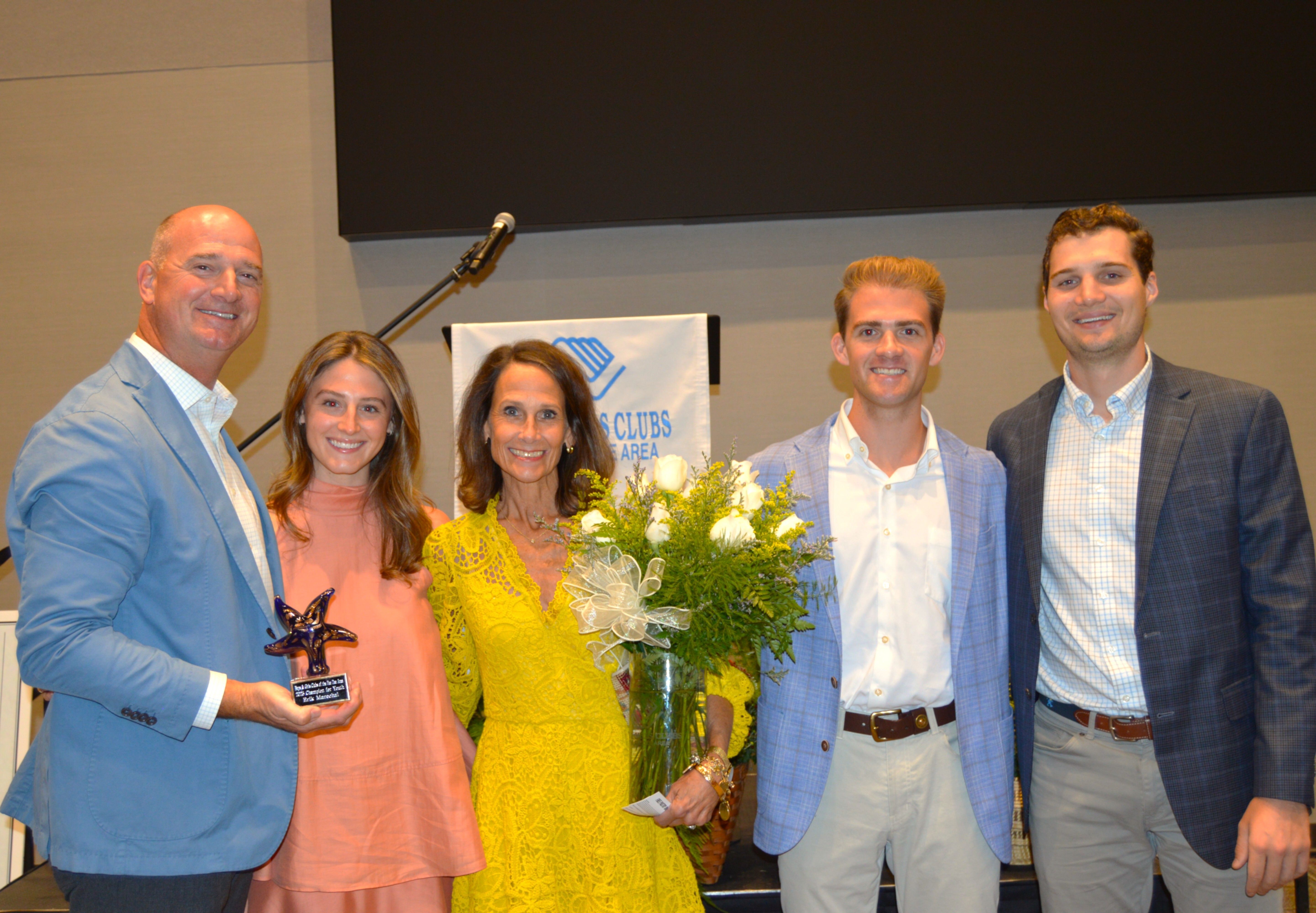 Longtime Boys & Girls Clubs of the Pee Dee Area Board Member Erik Marechal stands with his family after receiving the Champion for Youth Award on September 17 at SiMT.