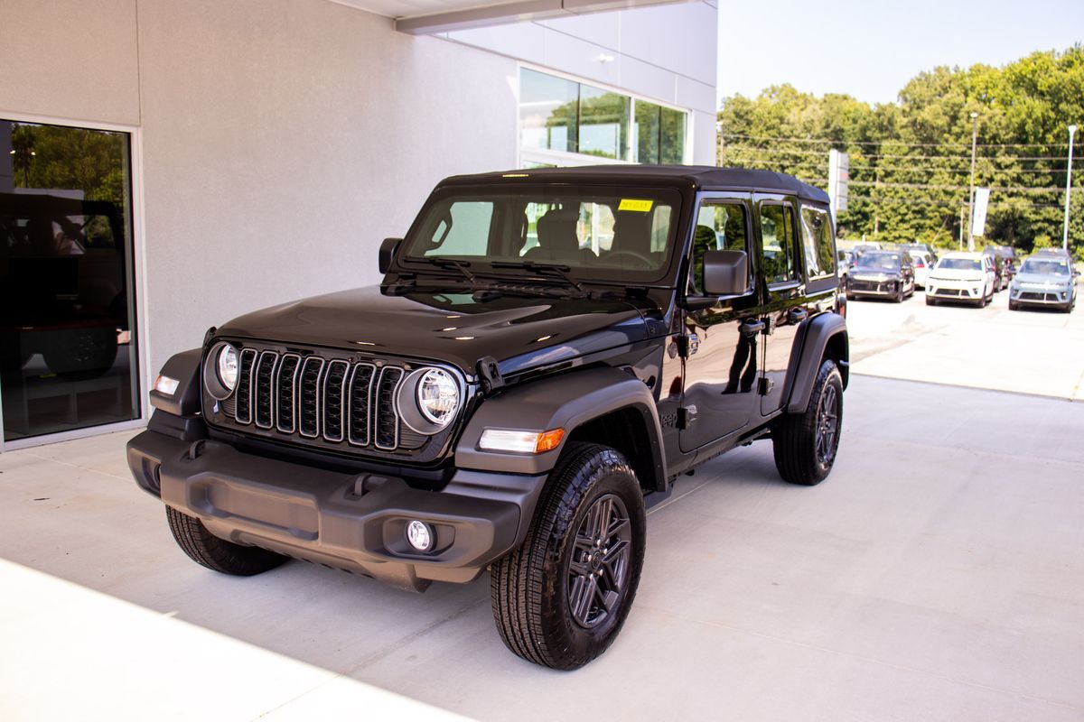 Jeep with an inflatable duck on top