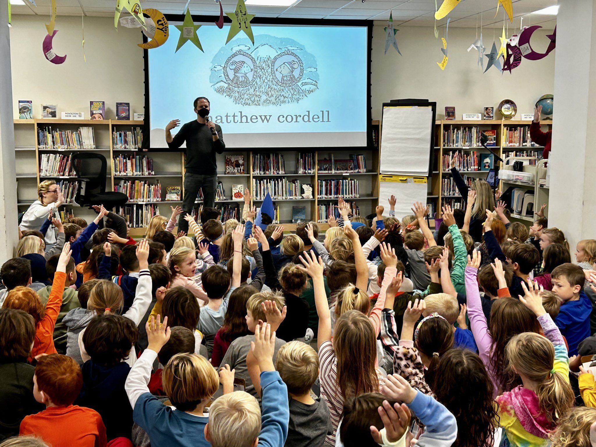 photo of Matthew Cordell with students