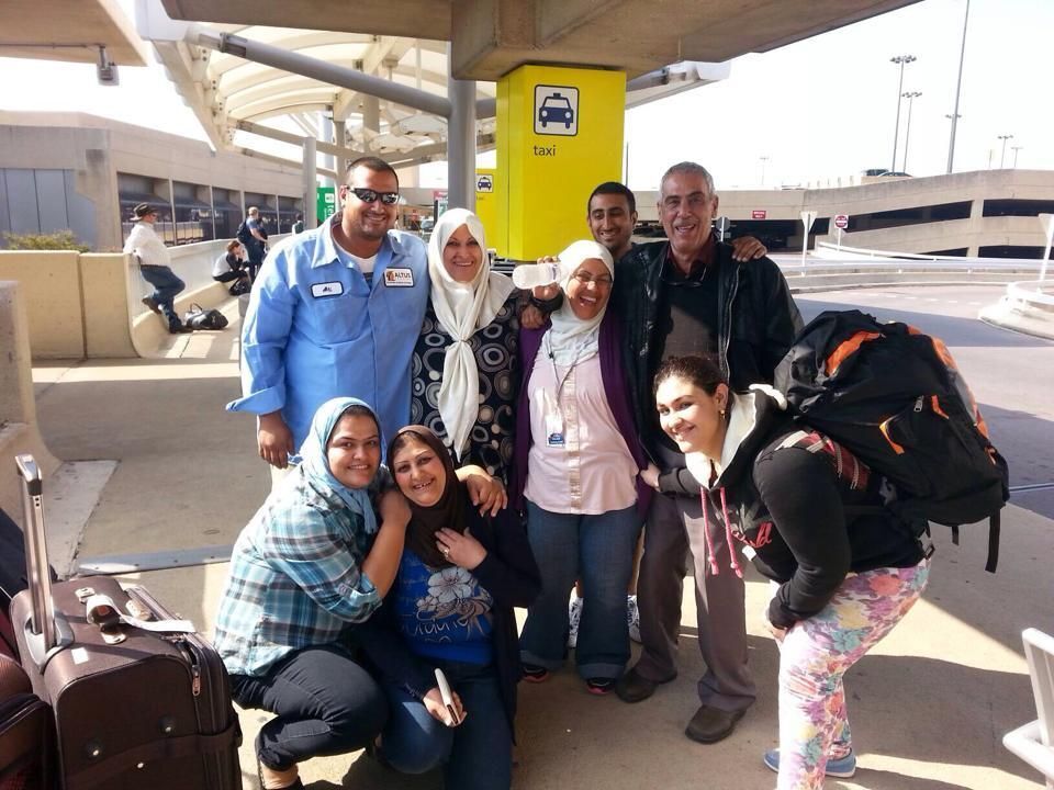 Photo of RST staff member and family arriving in the US