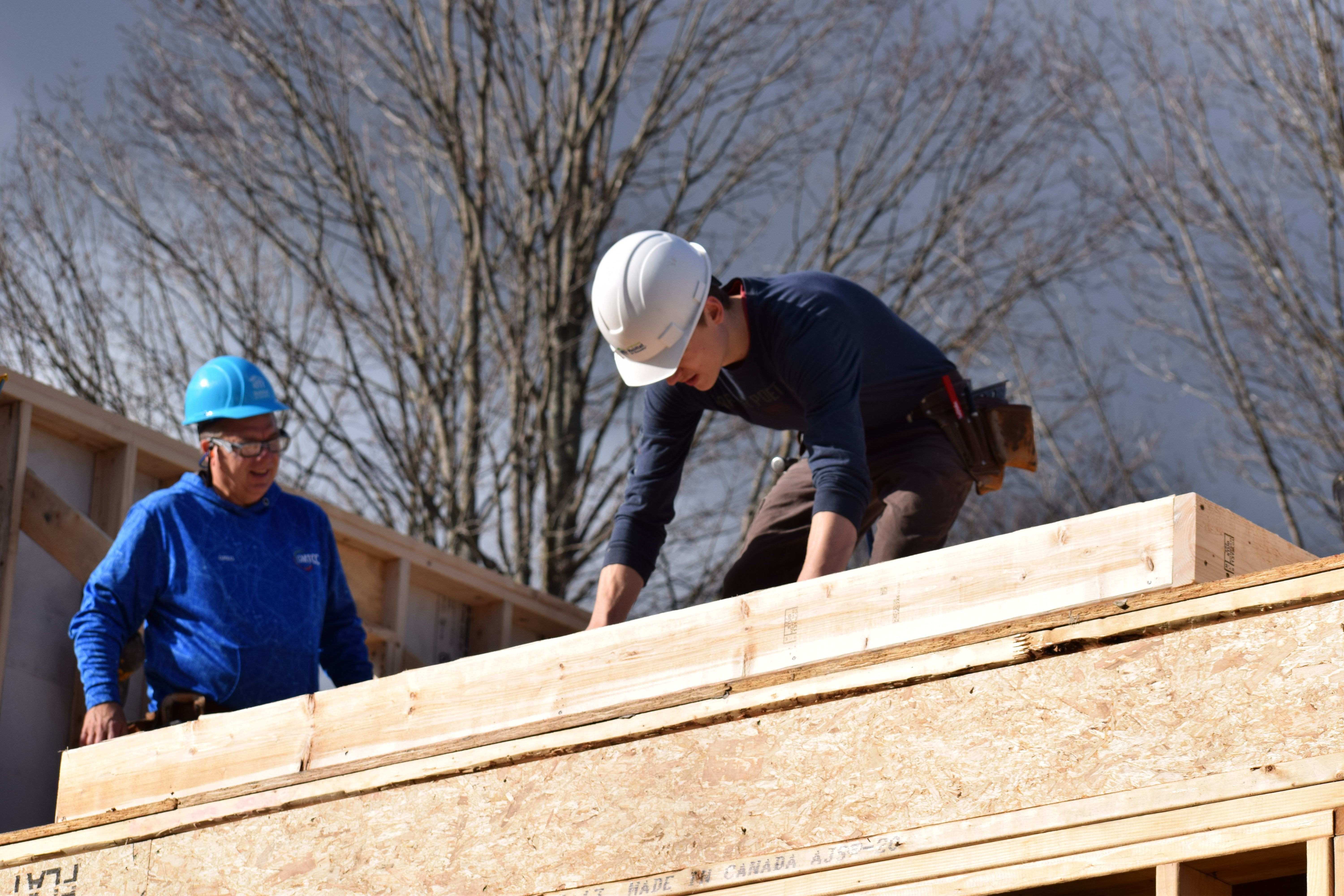 Green Mountain Technology and Career Center students work on Green Mountain Habitat for Humanity house as part of construction program