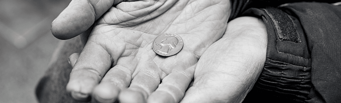 Hands with a coin