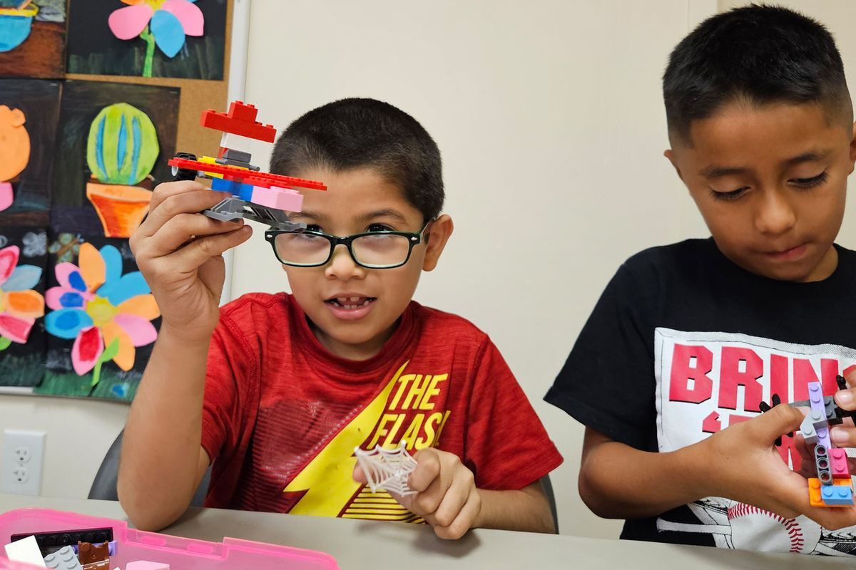 Children playing with Lego