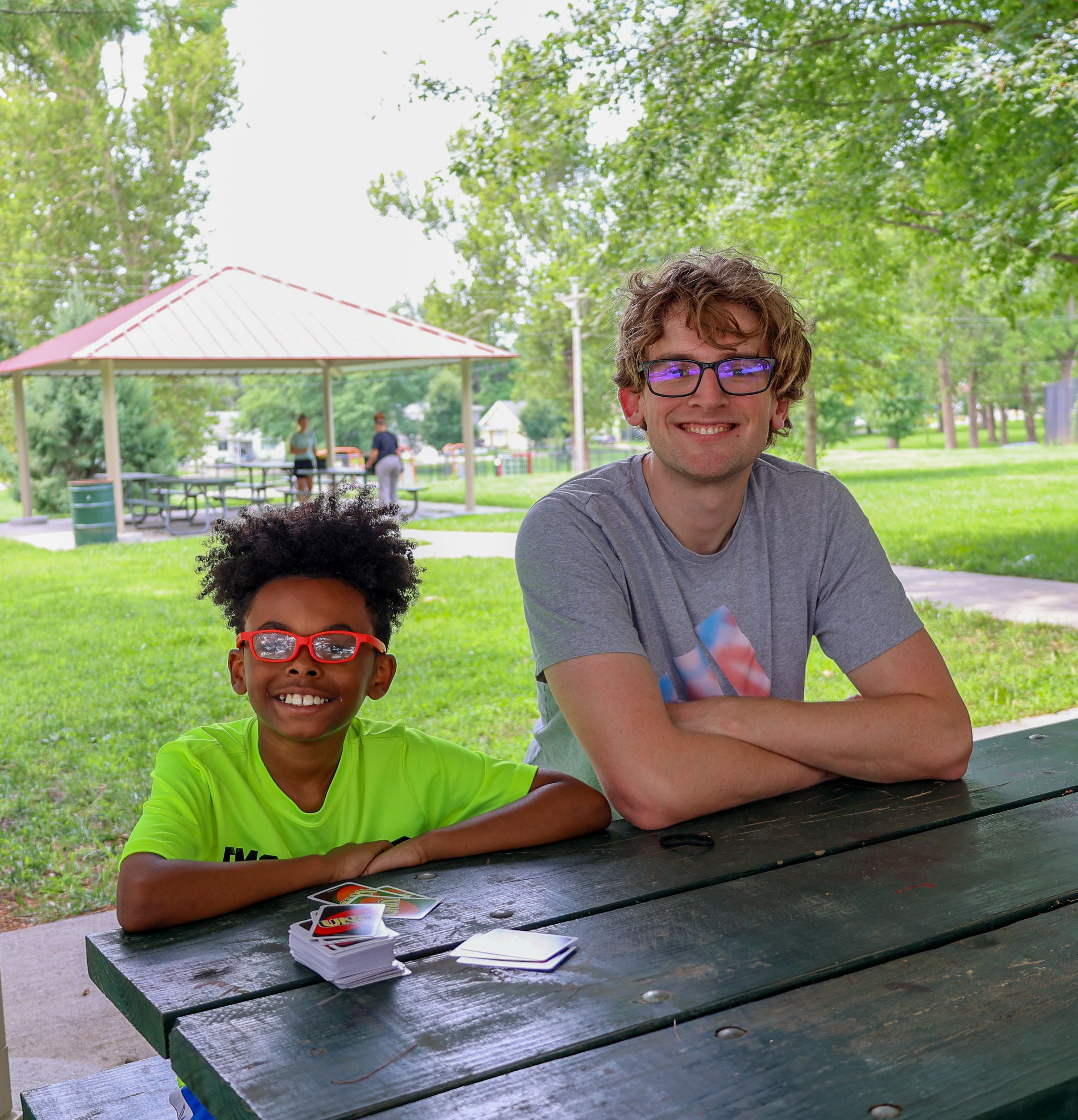 Mentee and mentor posing together at our Back to School event