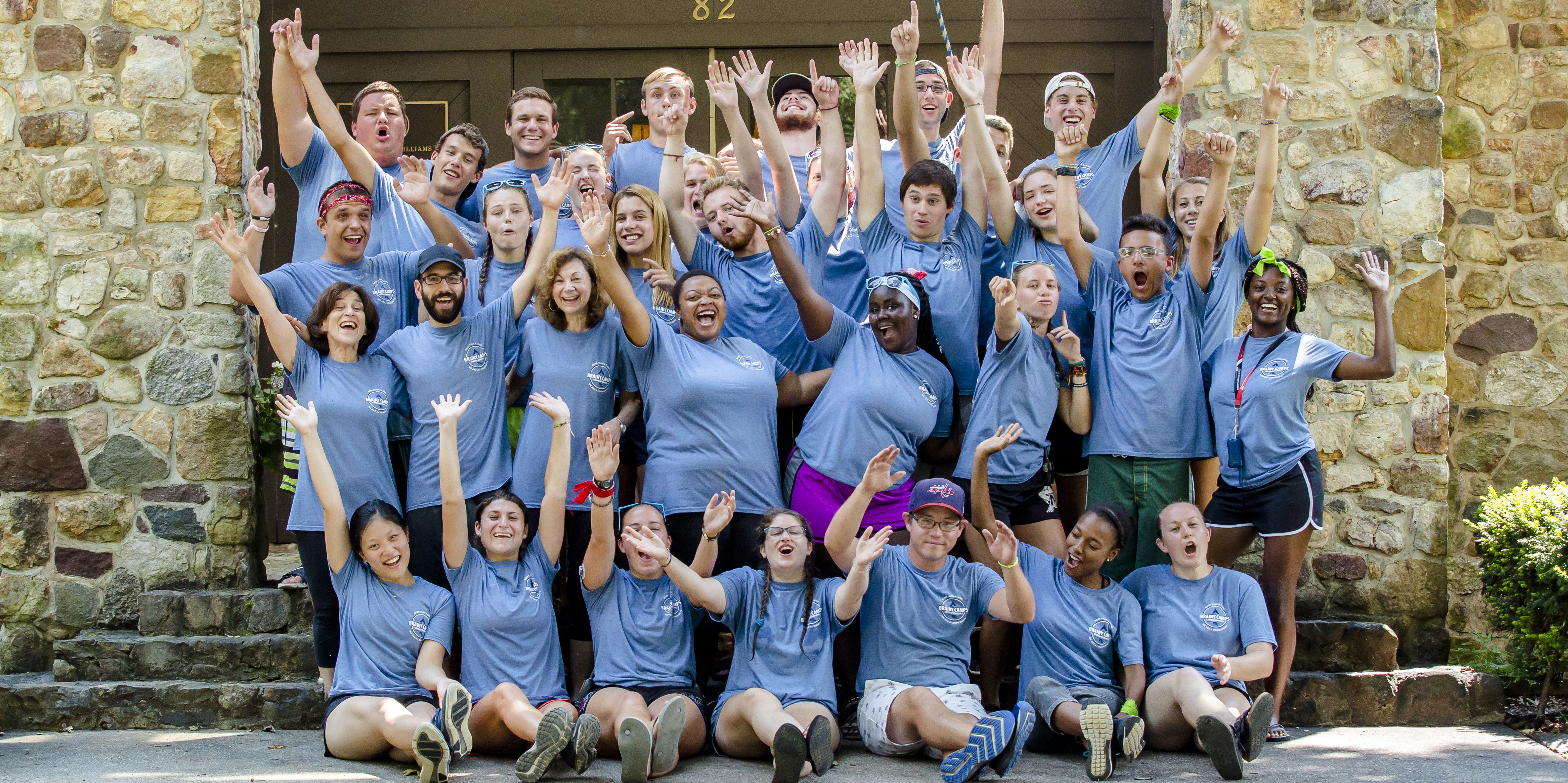 Counselors pose for a silly photo.