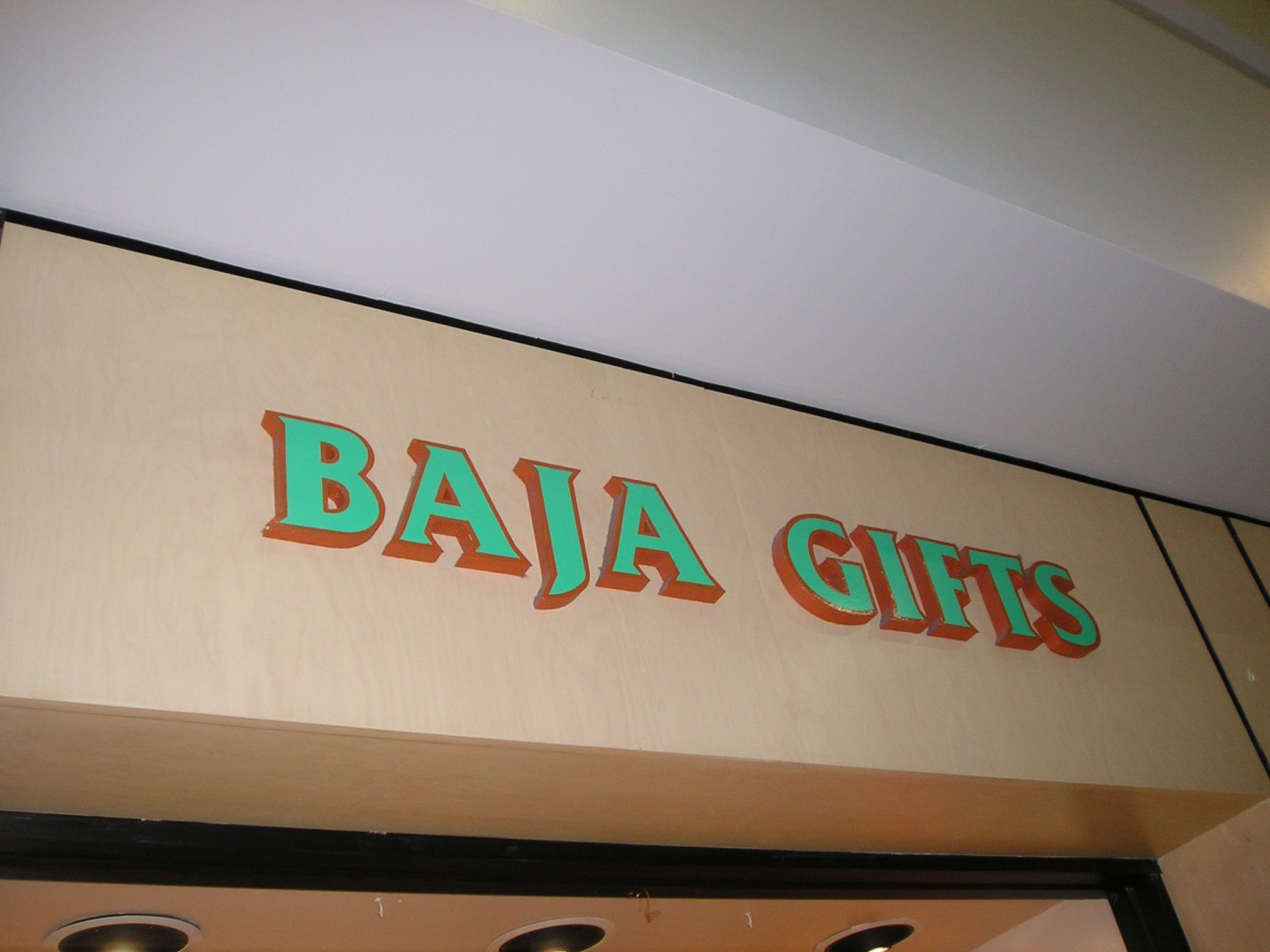 SA28343 - Shopping Mall Gift Shop Sign with Carved Raised Outline Letters.