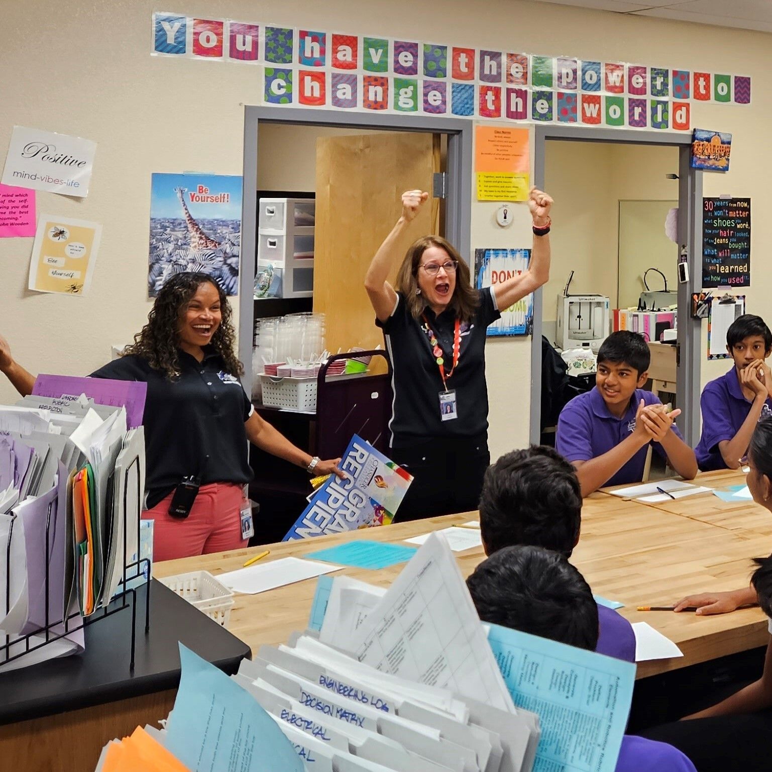 ACP Middle School teacher celebrates winning a Cash For Classrooms grant with her students