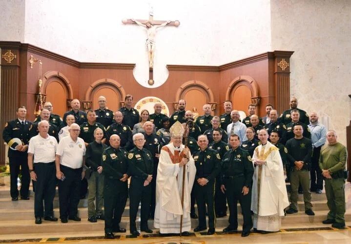 First responders and Bishop Barbarito