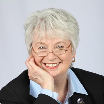 Picture of a middle-aged, smiling woman