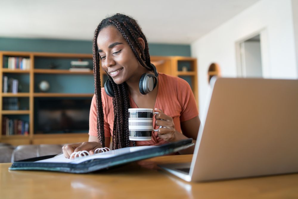 Child-serving professional looking up resources to support her work