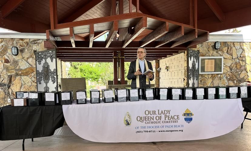 Father Gabriel Ghanoum presiding at the No One Buried Alone memorial service