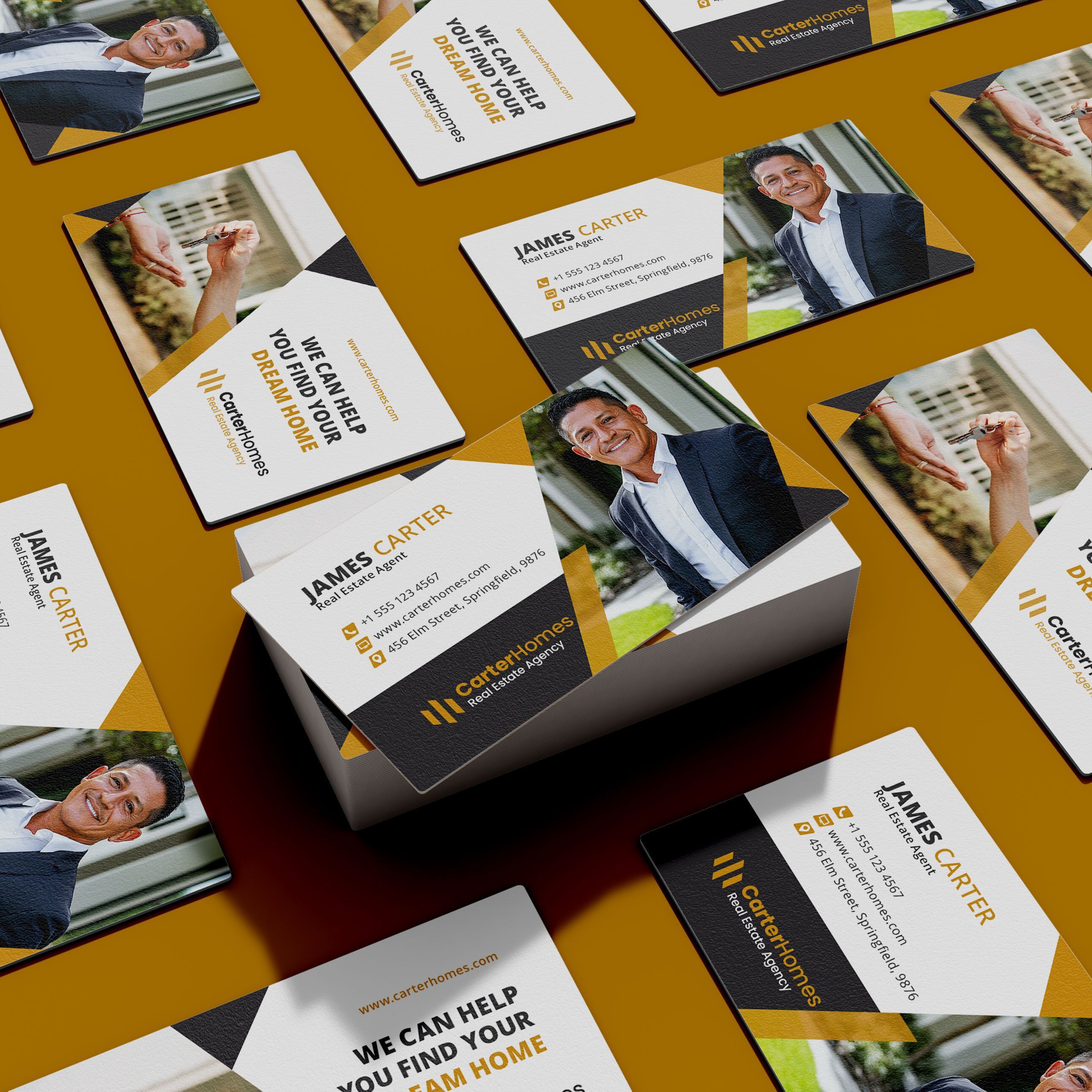 A close-up of freshly printed business cards being stacked by hand at a professional print shop in Boca Raton, showing vivid colors and crisp typography.