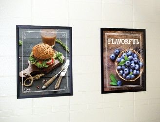 2 food image posters in frames on a wall, school signs, nutrition education, market café
