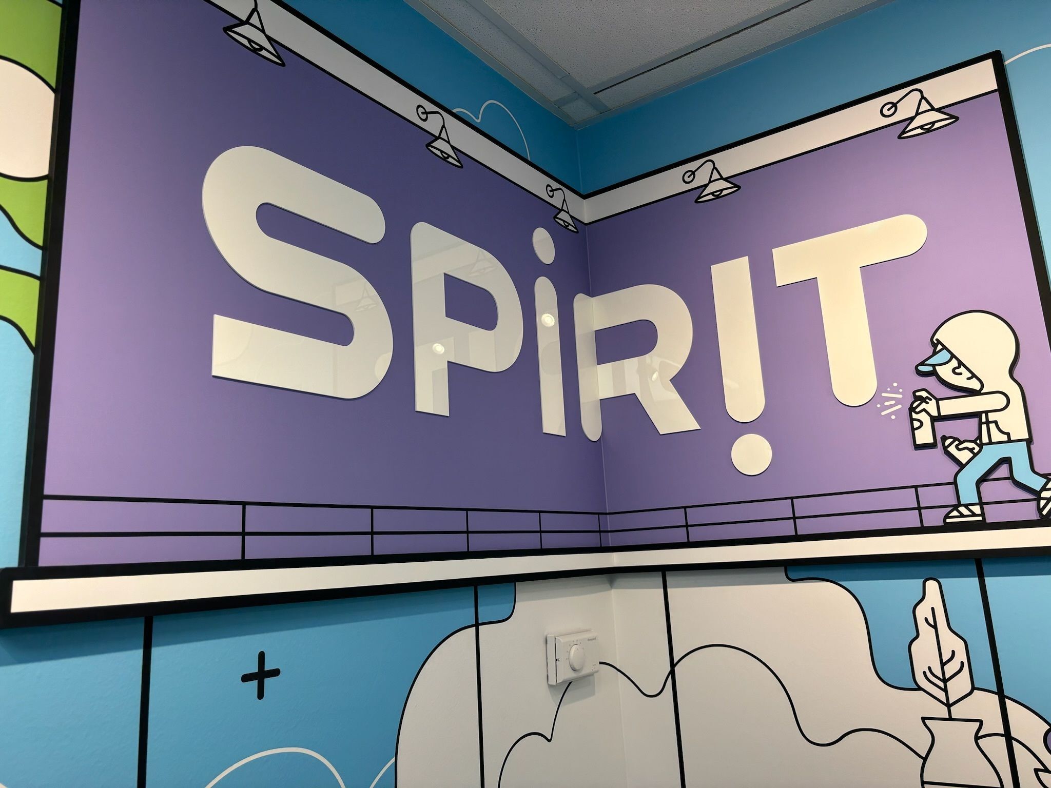 Words SPIRIT on wall with multic-olored graphics