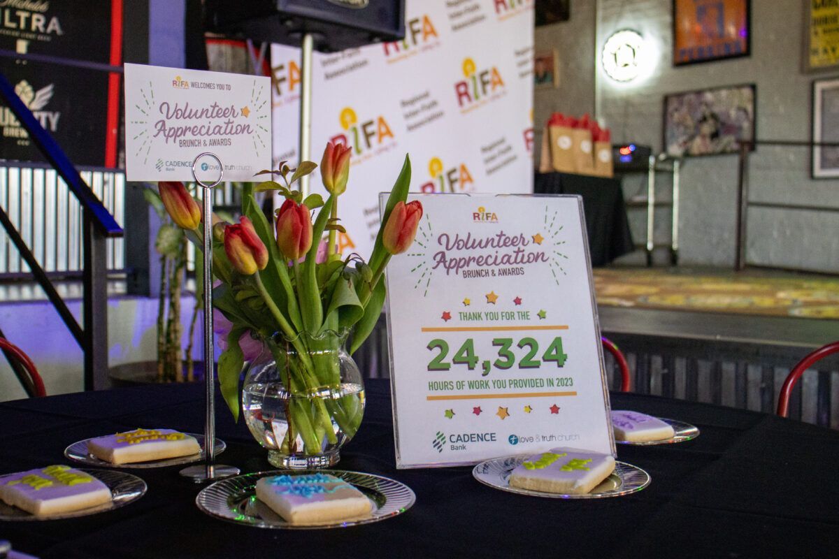 Table with signage at event