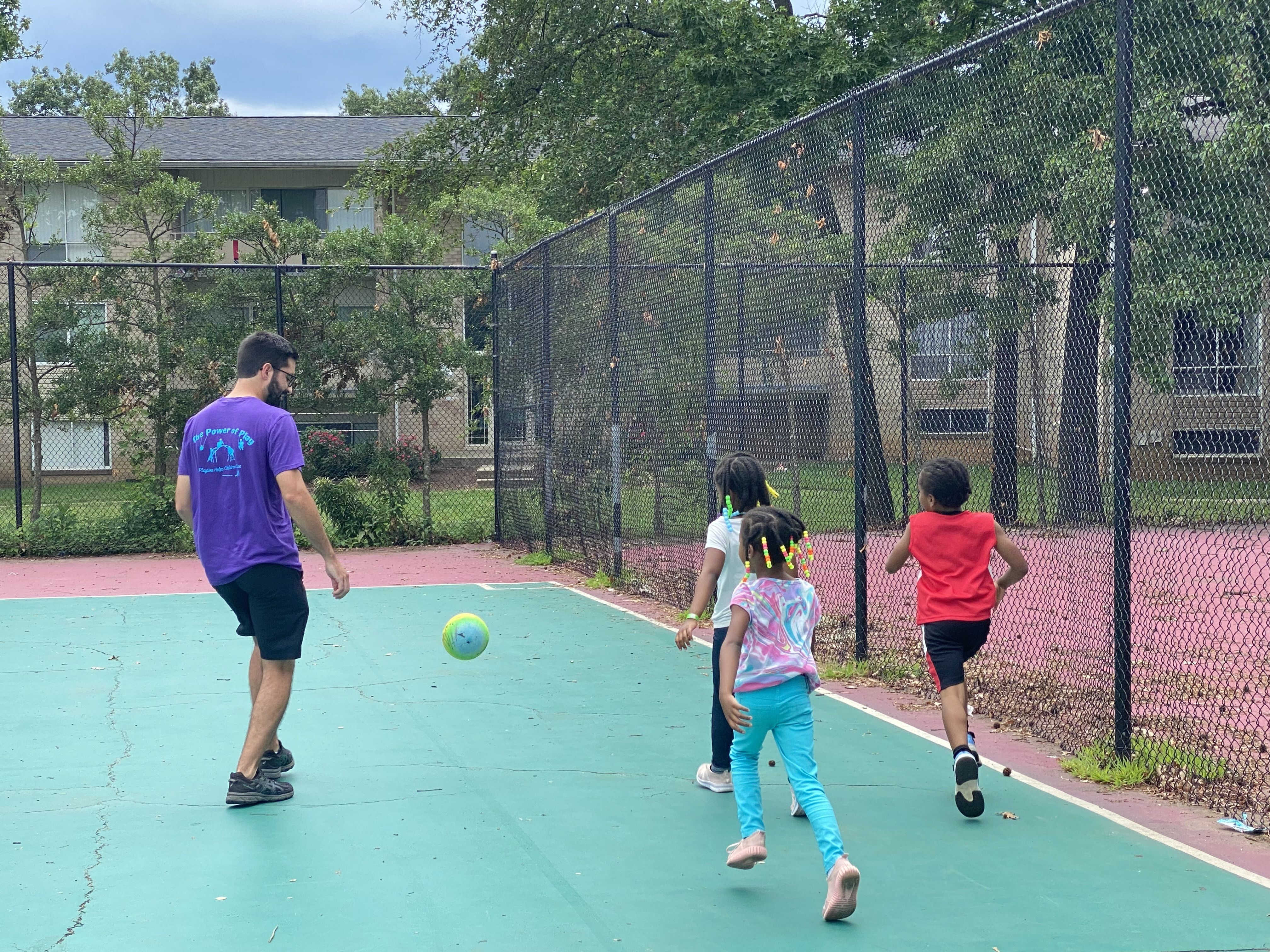 Children play outside during camp