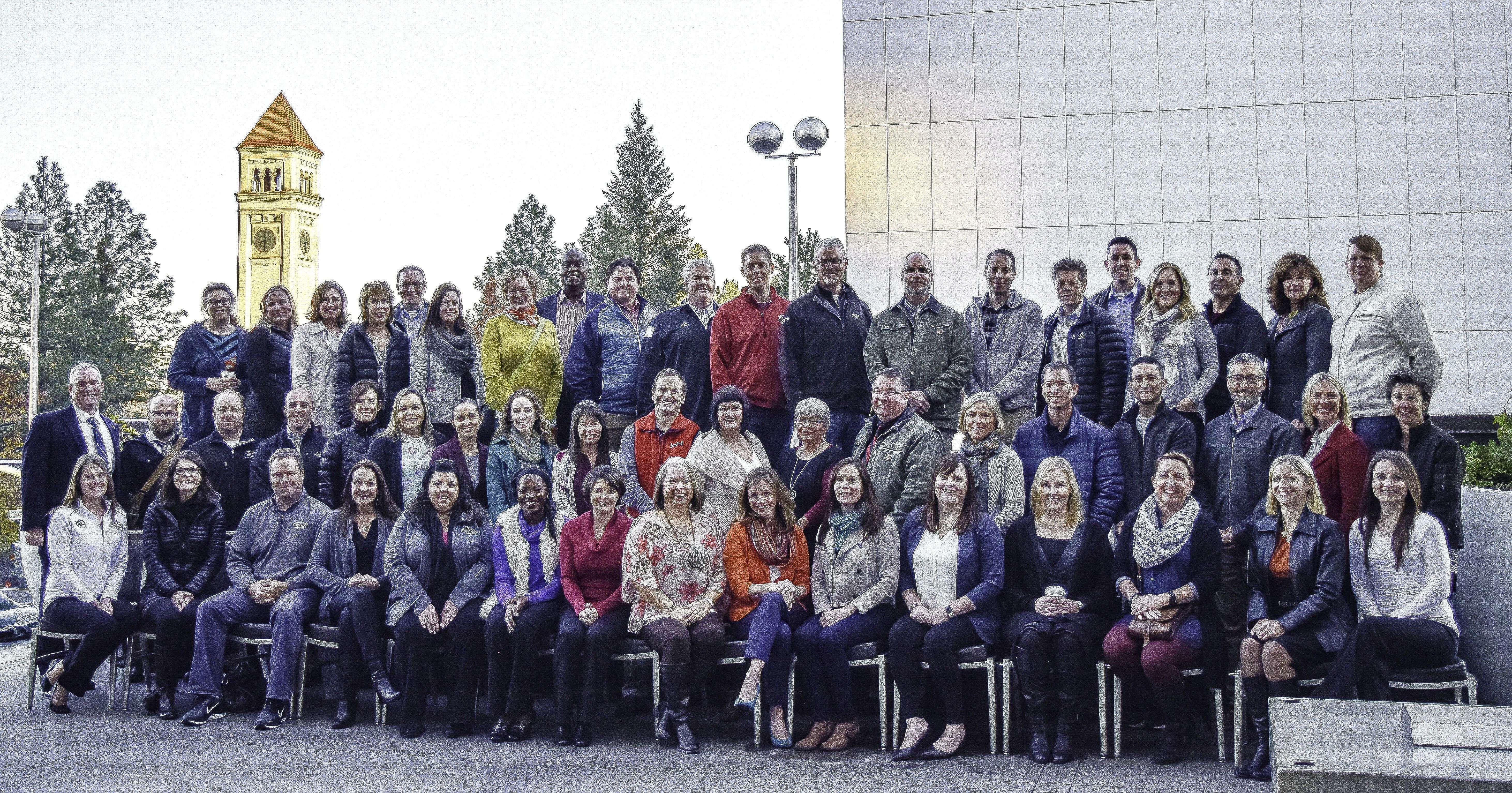 A group of people posing for a group photo