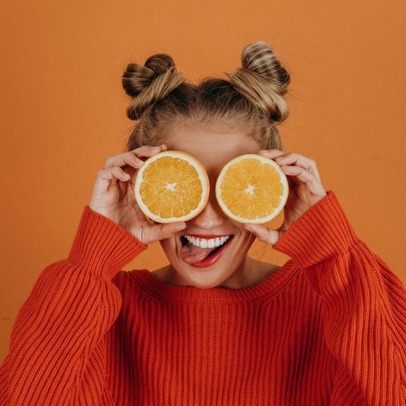 Person with Orange Slices (Square)