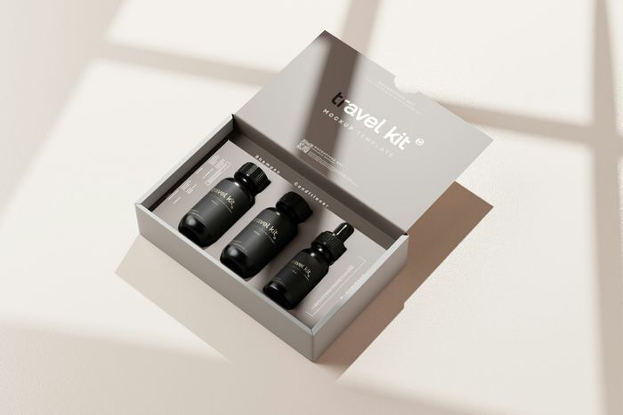 Modern e-commerce packaging travel kit displaying custom structural dividers and a printed QR code for digital integration