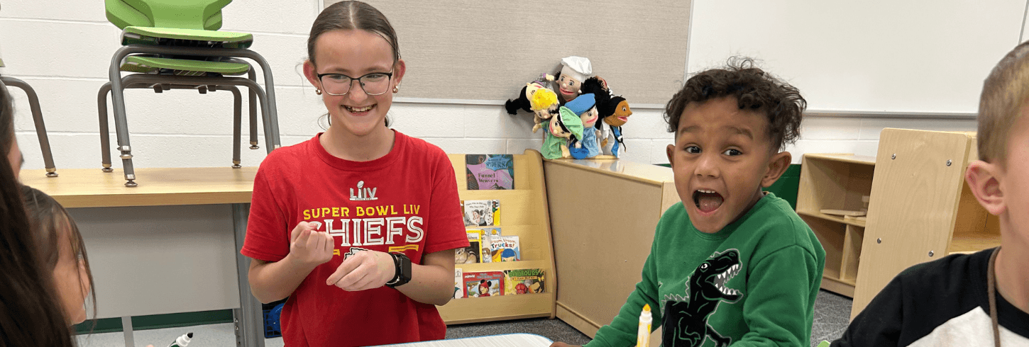 Boy playing in classroom