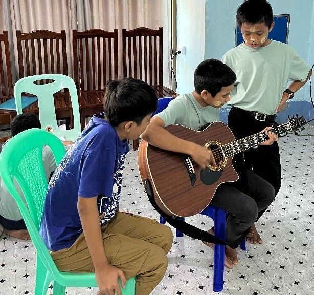 Guitar practice - we'll be playing in church soon. 
