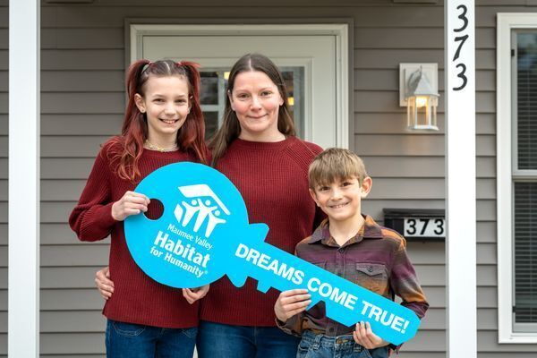 Paint Rollers in Green, Red, Orange and Blue