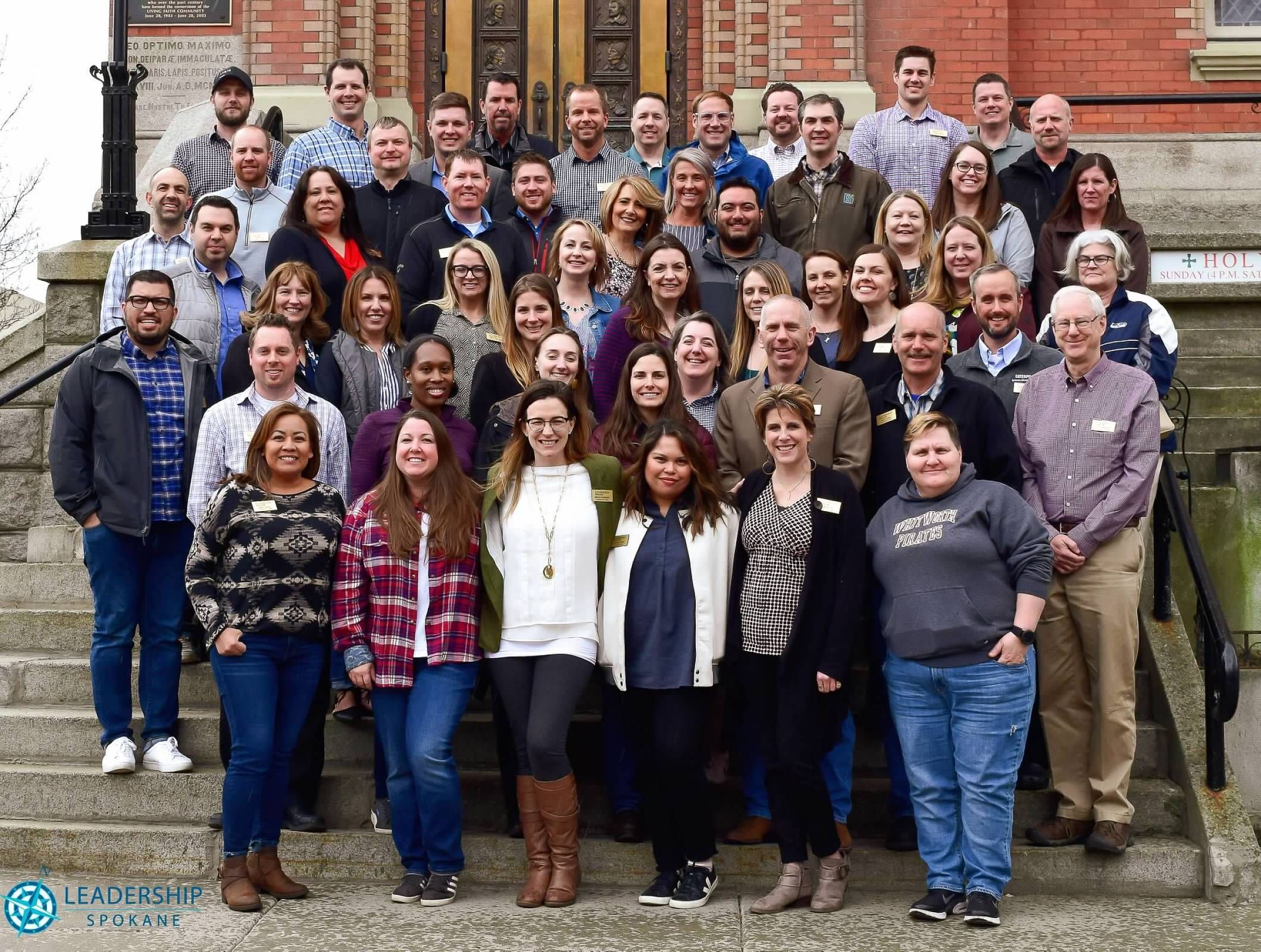 A group of people posing for a group photo