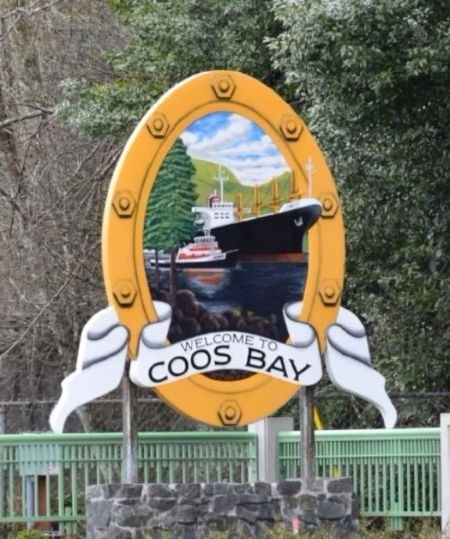 TA1050 - 16 ft tall entrance sign to Coos Bay, Oregon,  carved in 3-D bas-relief