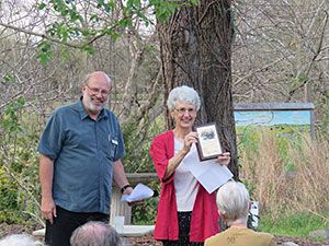 Volunteer Mary Carter and John Bartos 