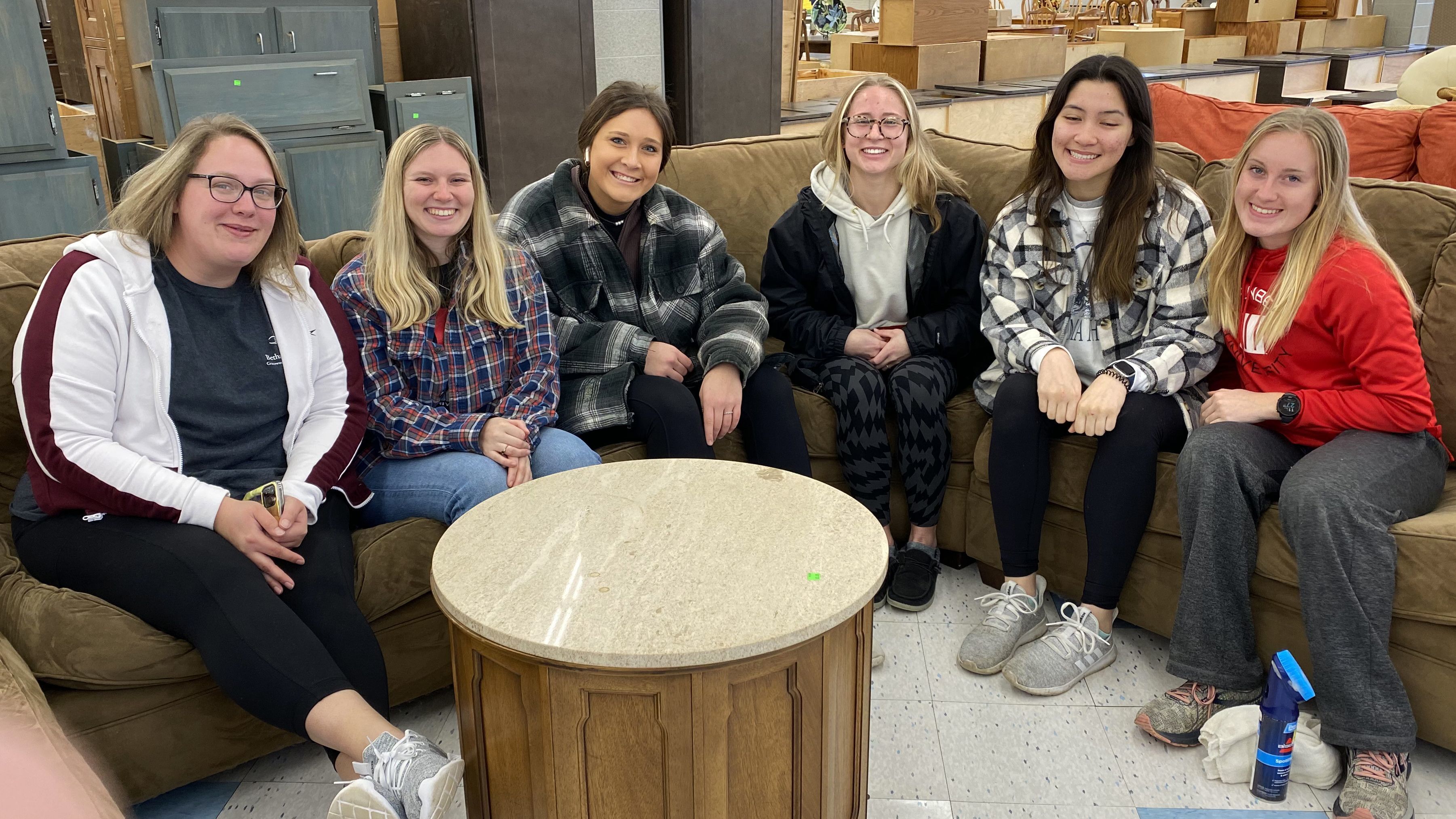 Wittenberg University Students rest after a day of volunteering for the Dayton Habitat ReStore in Springfield.