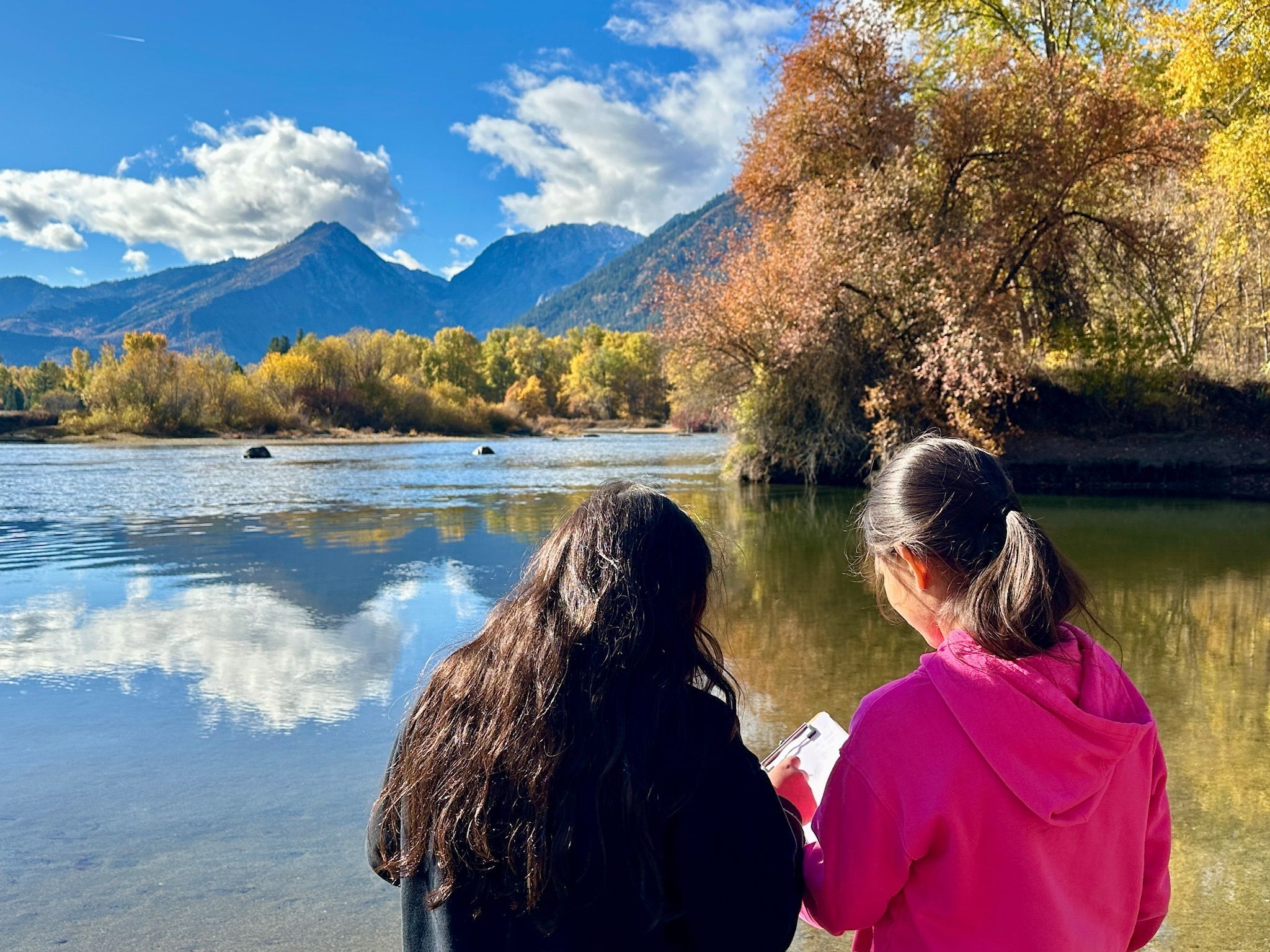 Two young girls overlooking the Wenatchee River and Wedge Mountain on a Field Day to WRI.