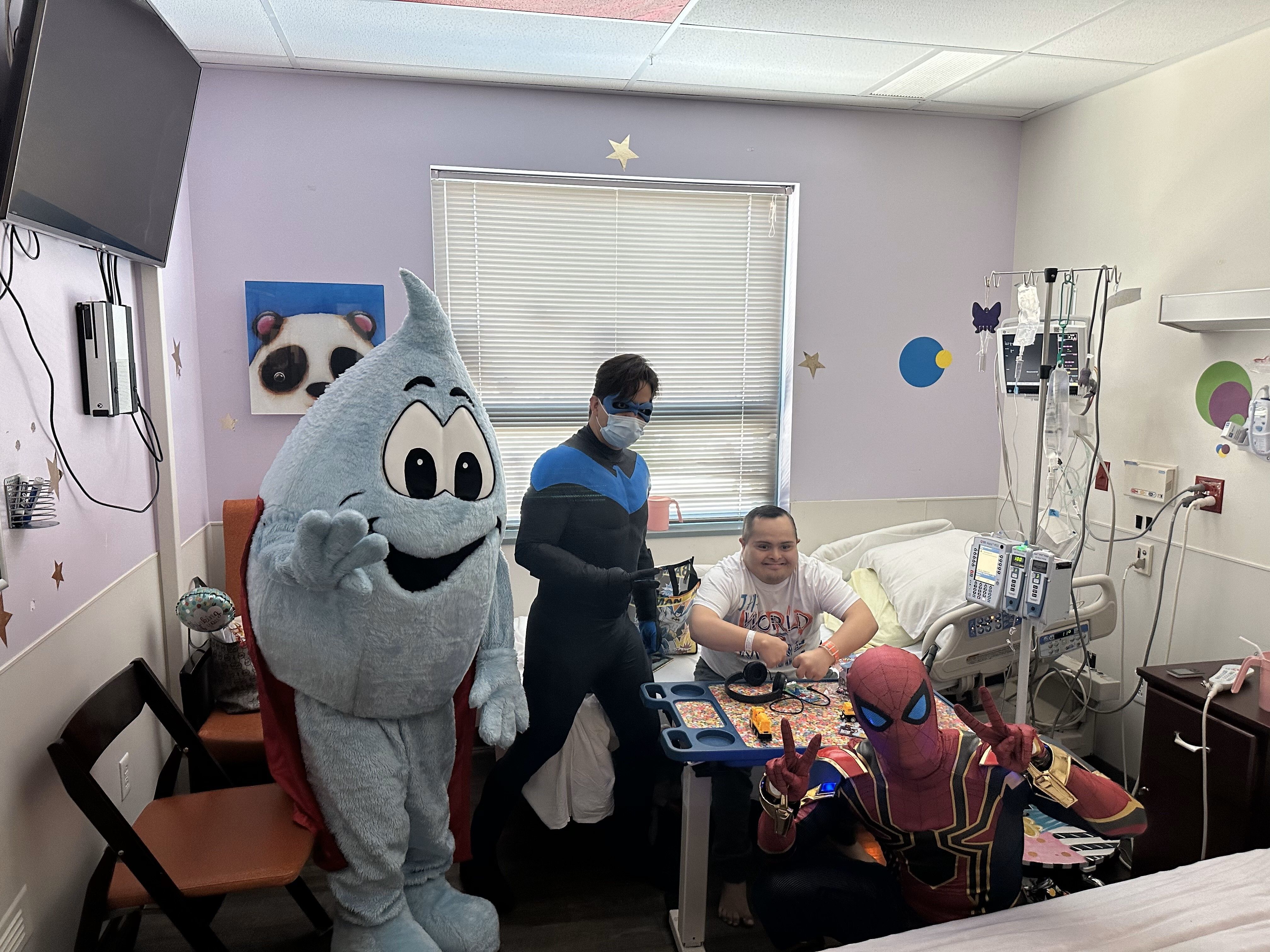 Superheroes visit Las Vegas Valley hospital's pediatric ward