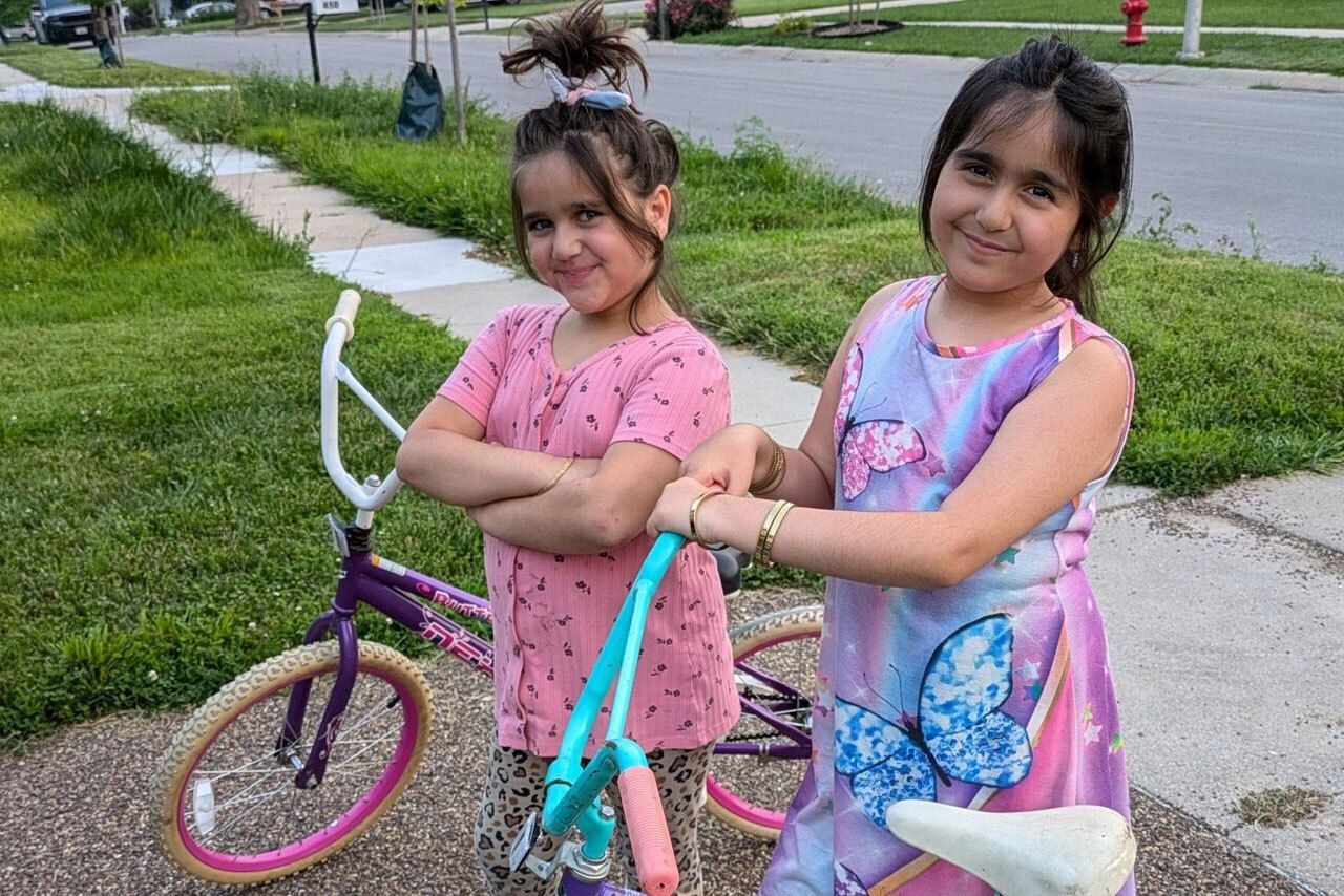 Girls receive their new bikes from LBK.