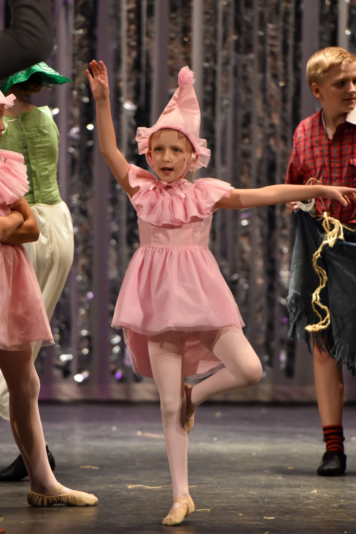 A little girl dancing in Wizard of Oz from a CAP performance.