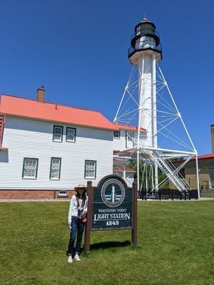 Sarah stands in front of the Great Lakes Shipwreck Museum in Michigan's Upper Peninsula.