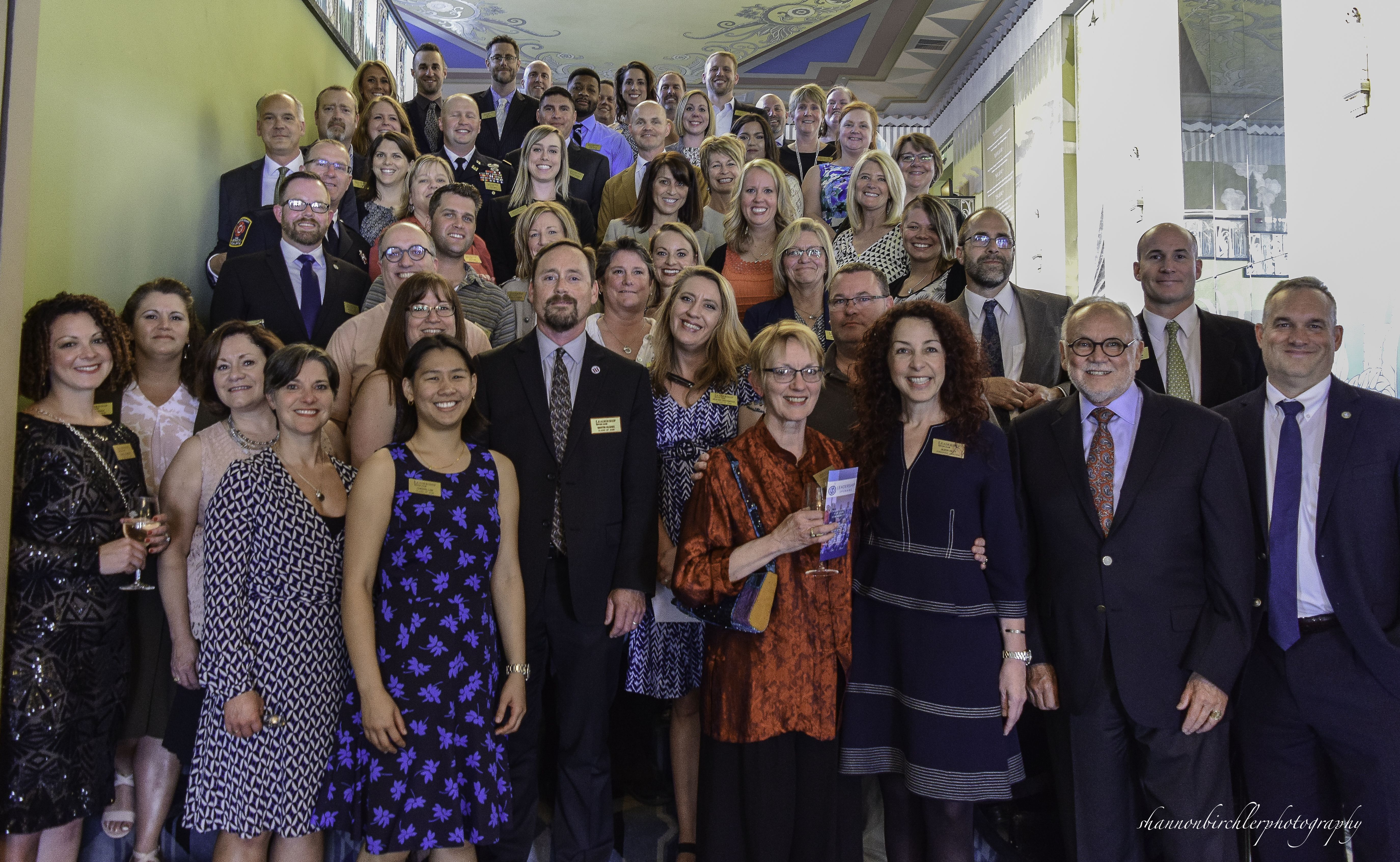 A group of people posing for a group photo