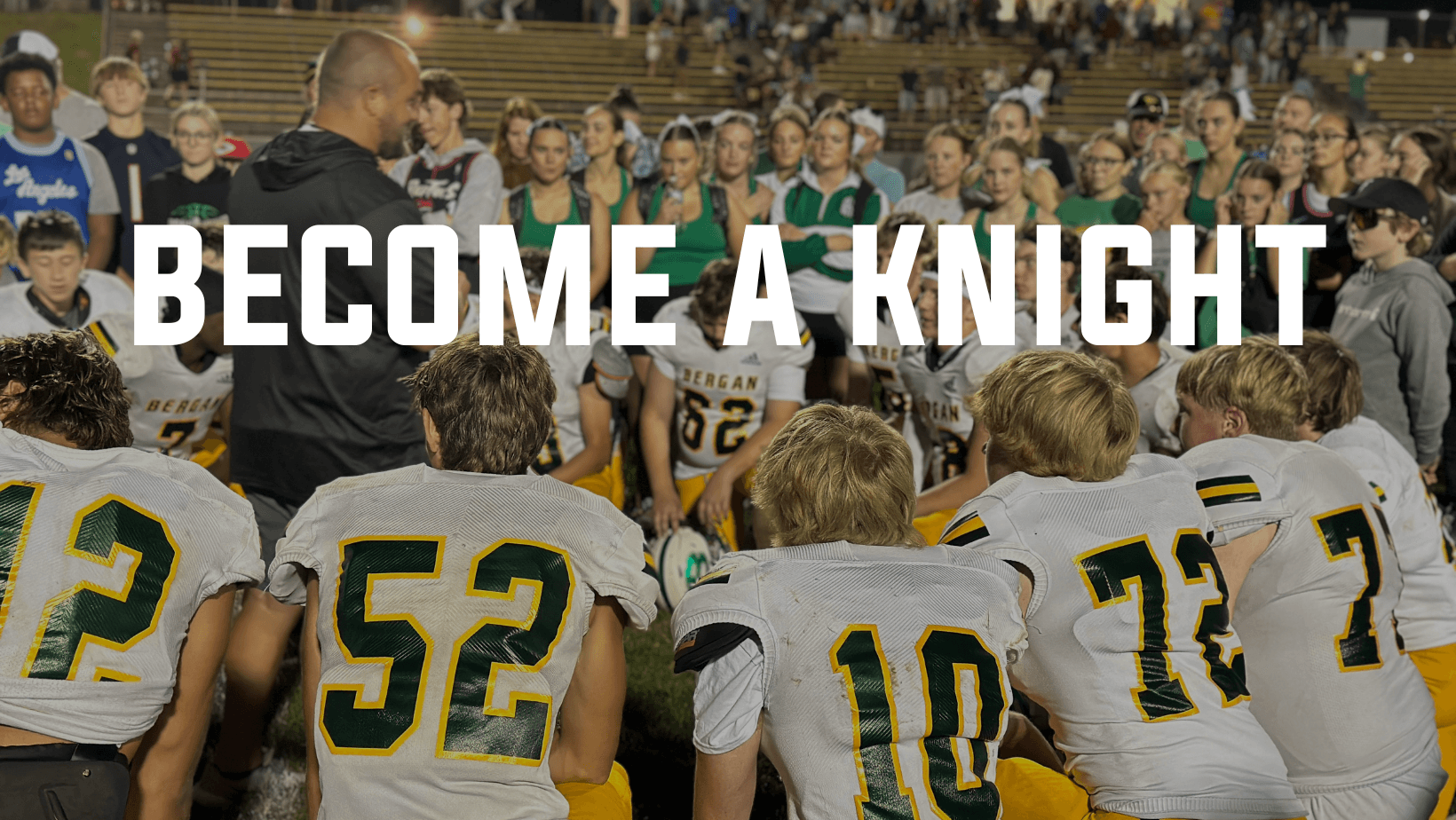 Football players with Coach Mruz after their first victory of the season.