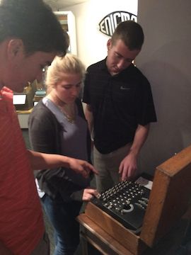 Students use Enigma machine