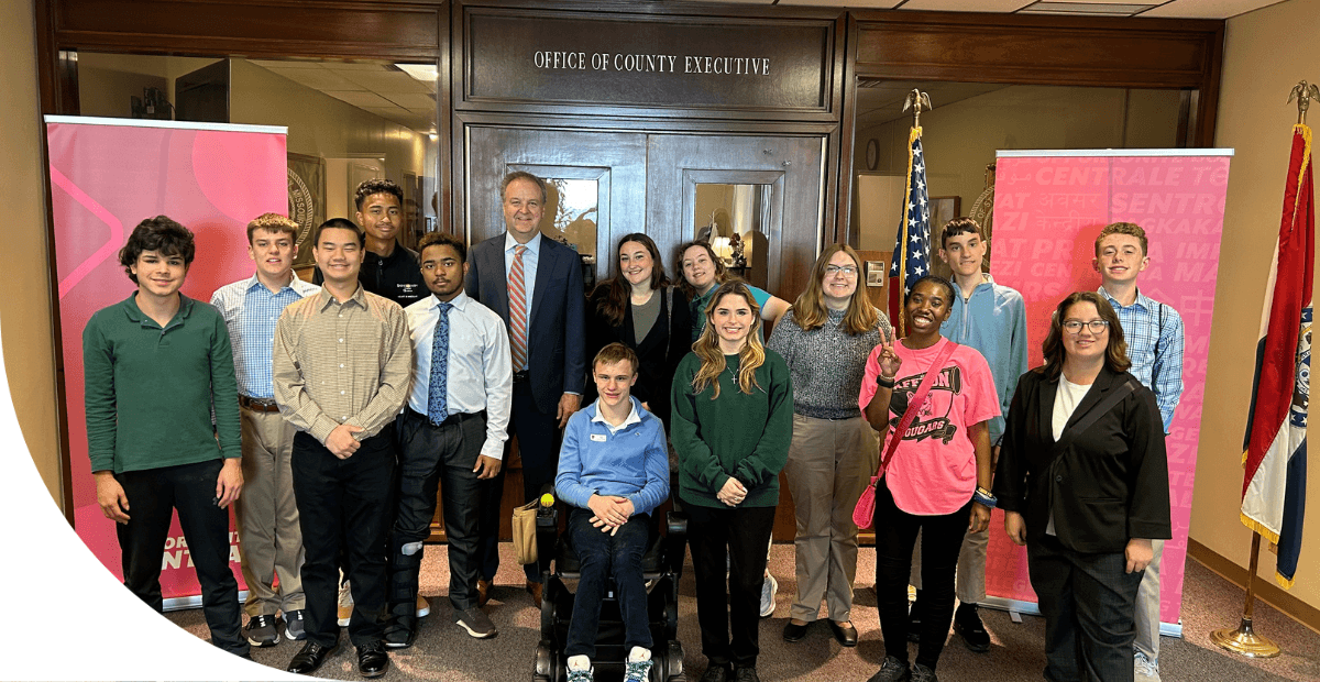 students visiting with county executive standing in a line